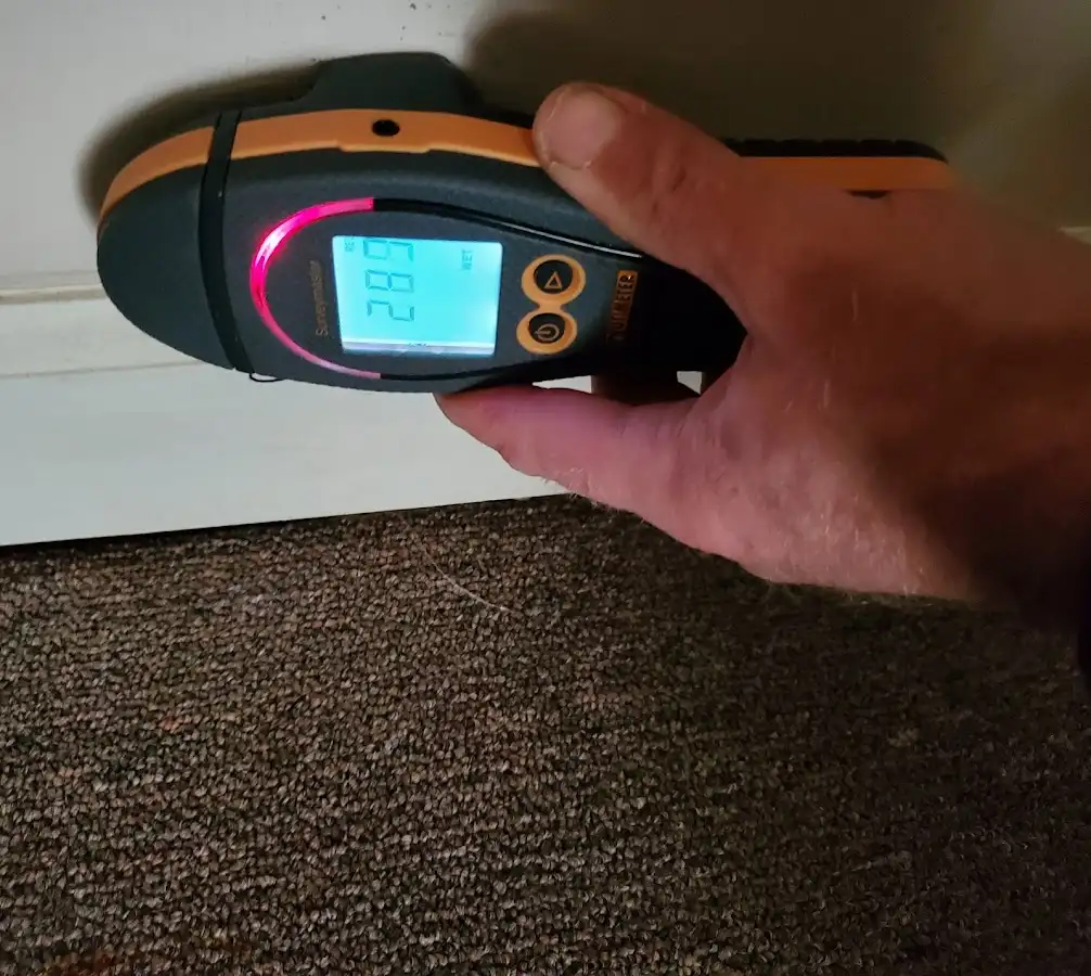 Moisture detection at baseboard during Sewage Cleanup & Sanitation in Oakland Park